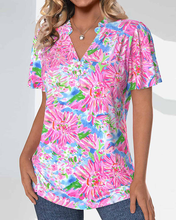 Short-sleeved floral button-up blouse