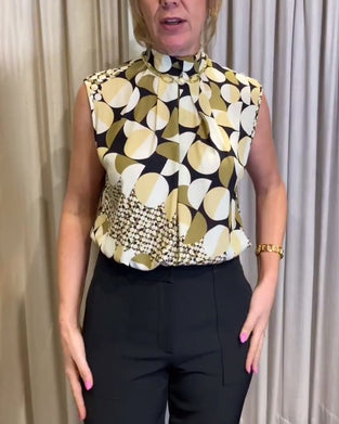 Geometric print turtleneck sleeveless top