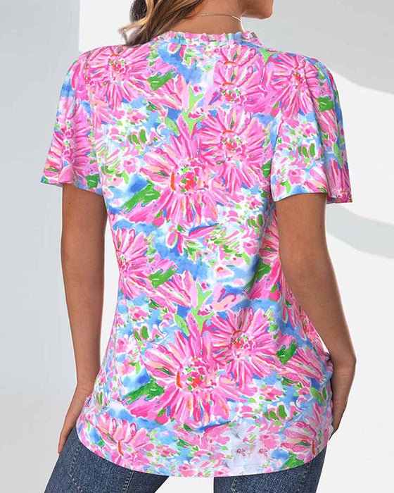 Short-sleeved floral button-up blouse