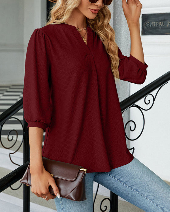 Solid color v-neck jacquard blouse