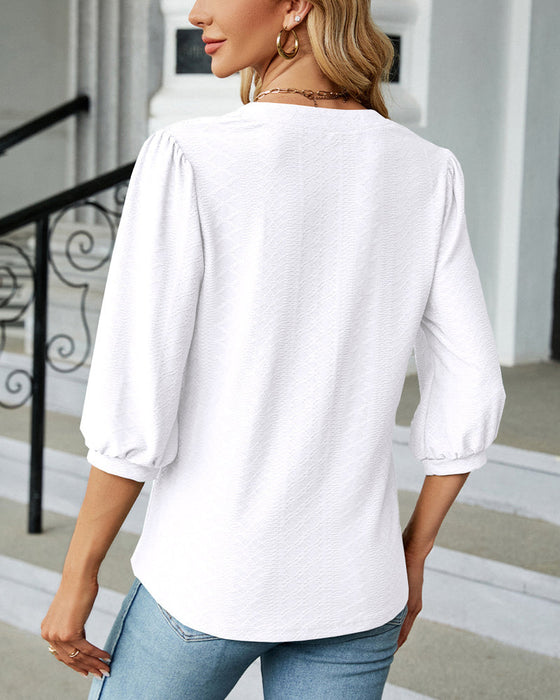 Solid color v-neck jacquard blouse