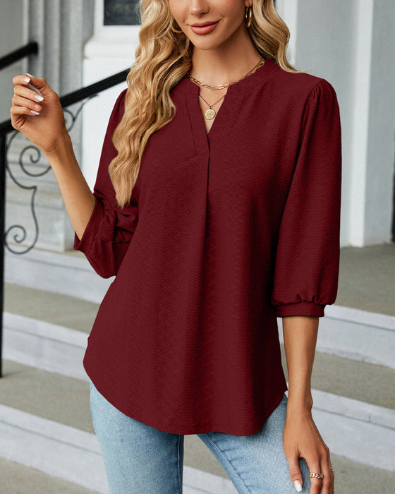 Solid color v-neck jacquard blouse