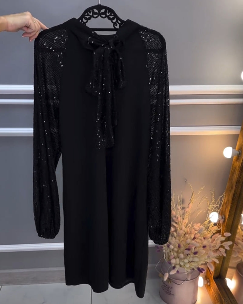 Solid color dress with patchwork sleeves