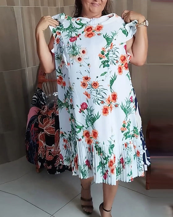 Paneled pleated floral print dress