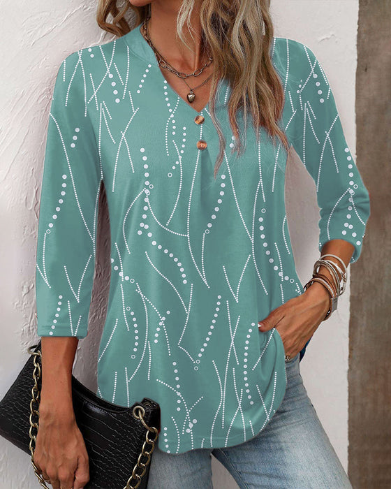 Elegant button print top with V neck
