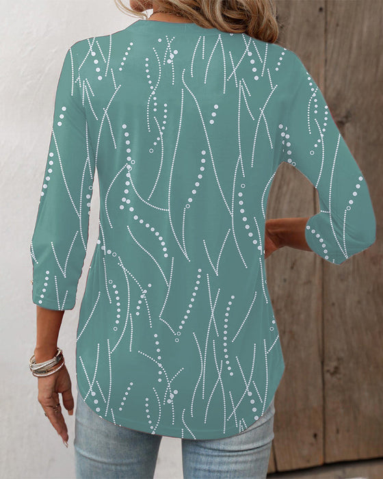 Elegant button print top with V neck