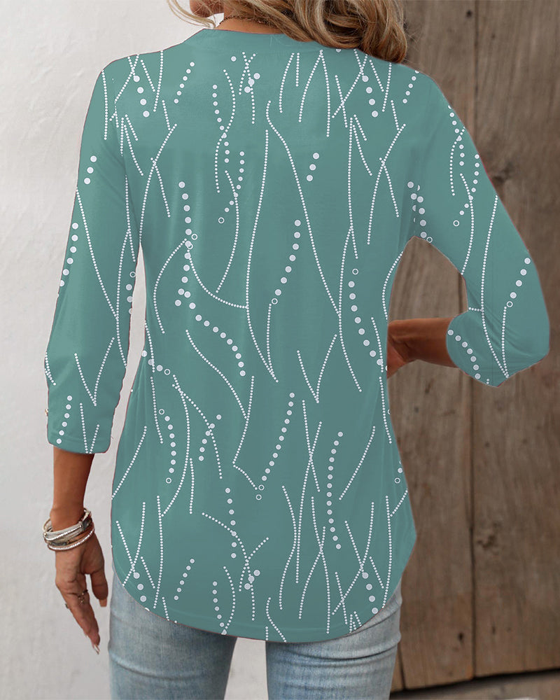 Elegant button print top with V neck