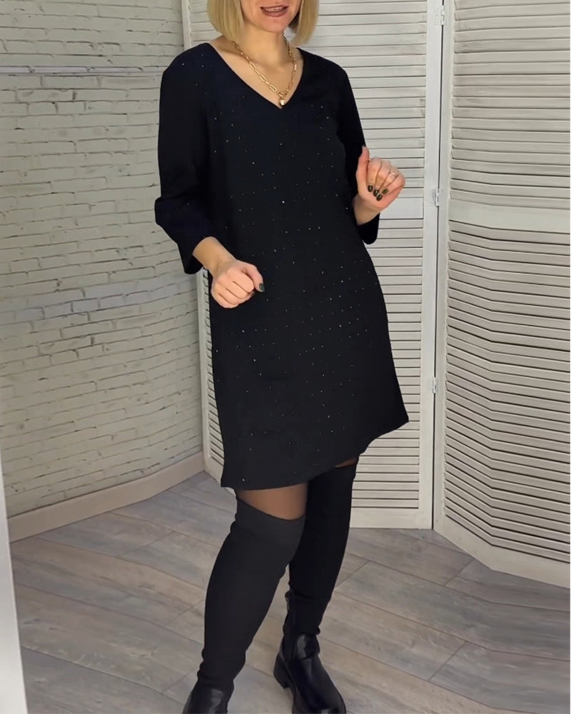 Elegant v-neck dress with three-quarter sleeves
