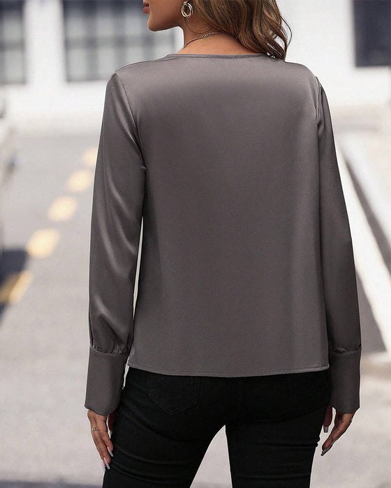 Pleated solid color blouse