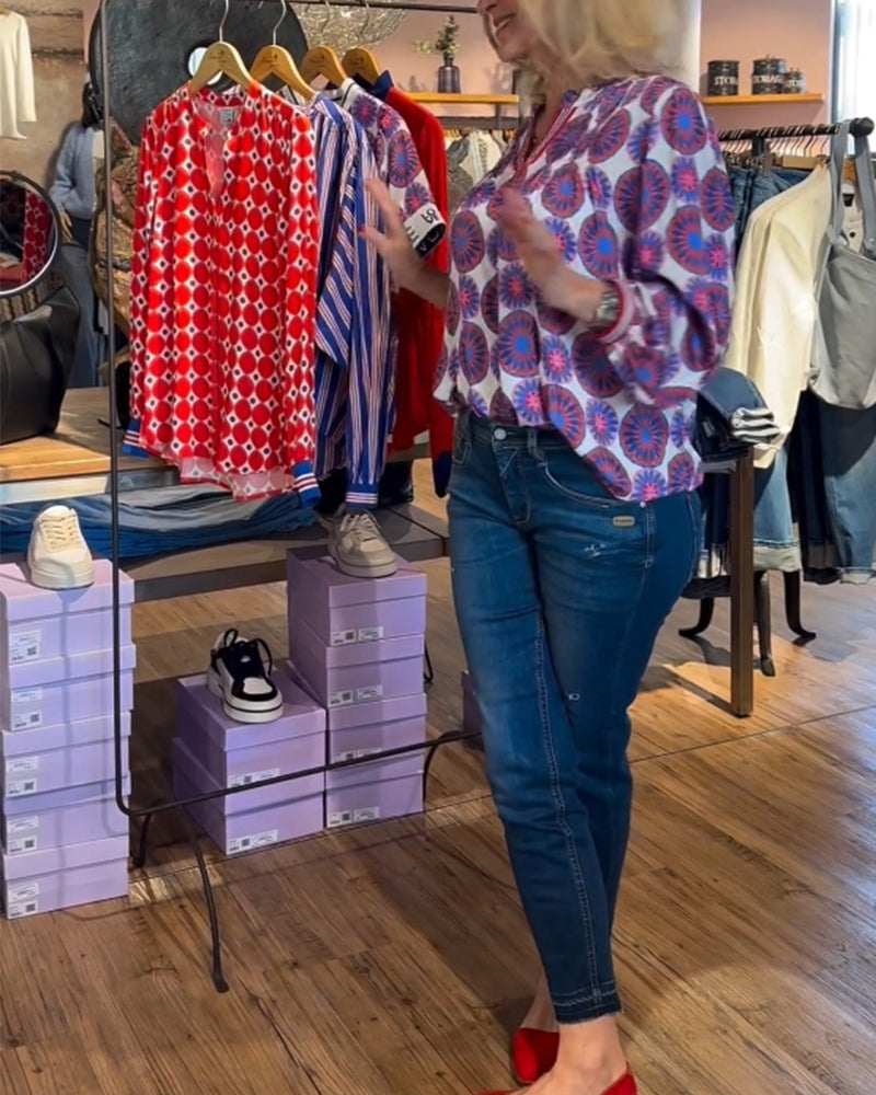 Elegant v-neck blouse with geometric print