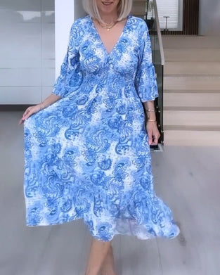 V-neck belted printed flowy dress