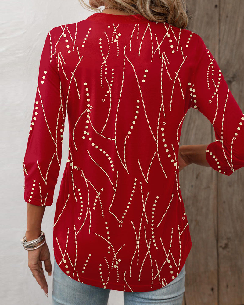 Elegant button print top with V neck
