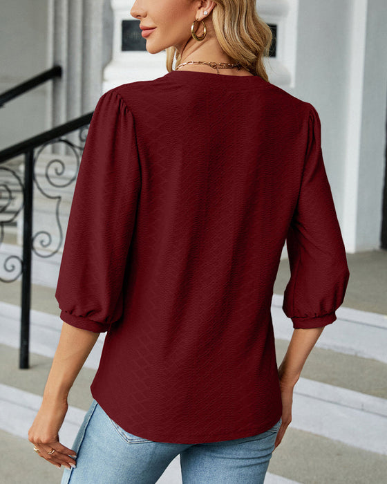 Solid color v-neck jacquard blouse