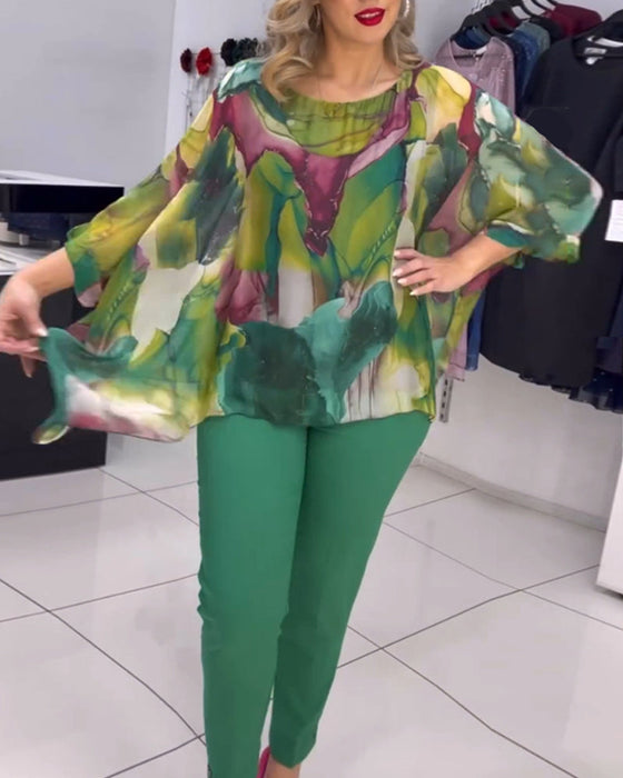 Printed crew neck bat sleeve blouse