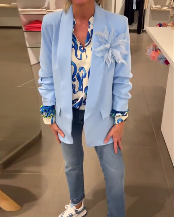 Elegant long-sleeved top with printed V-neck