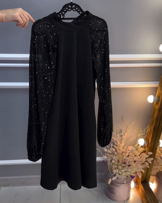 Solid color dress with patchwork sleeves