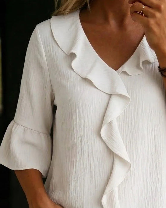 Textured Ruffled Bell Sleeve Blouse