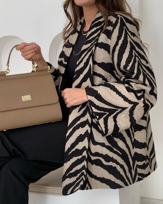 Elegant coat with zebra print