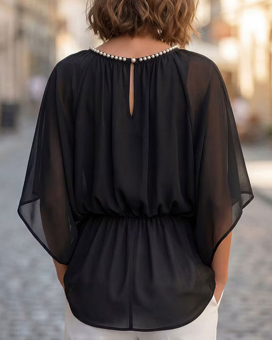 Solid-Color Batwing-Sleeve Blouse With A Fitted Waist