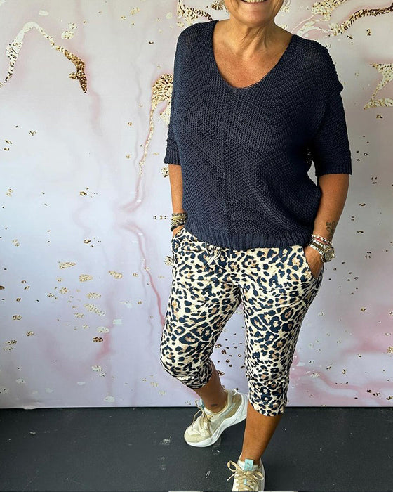 Slim-fit leopard print cropped trousers